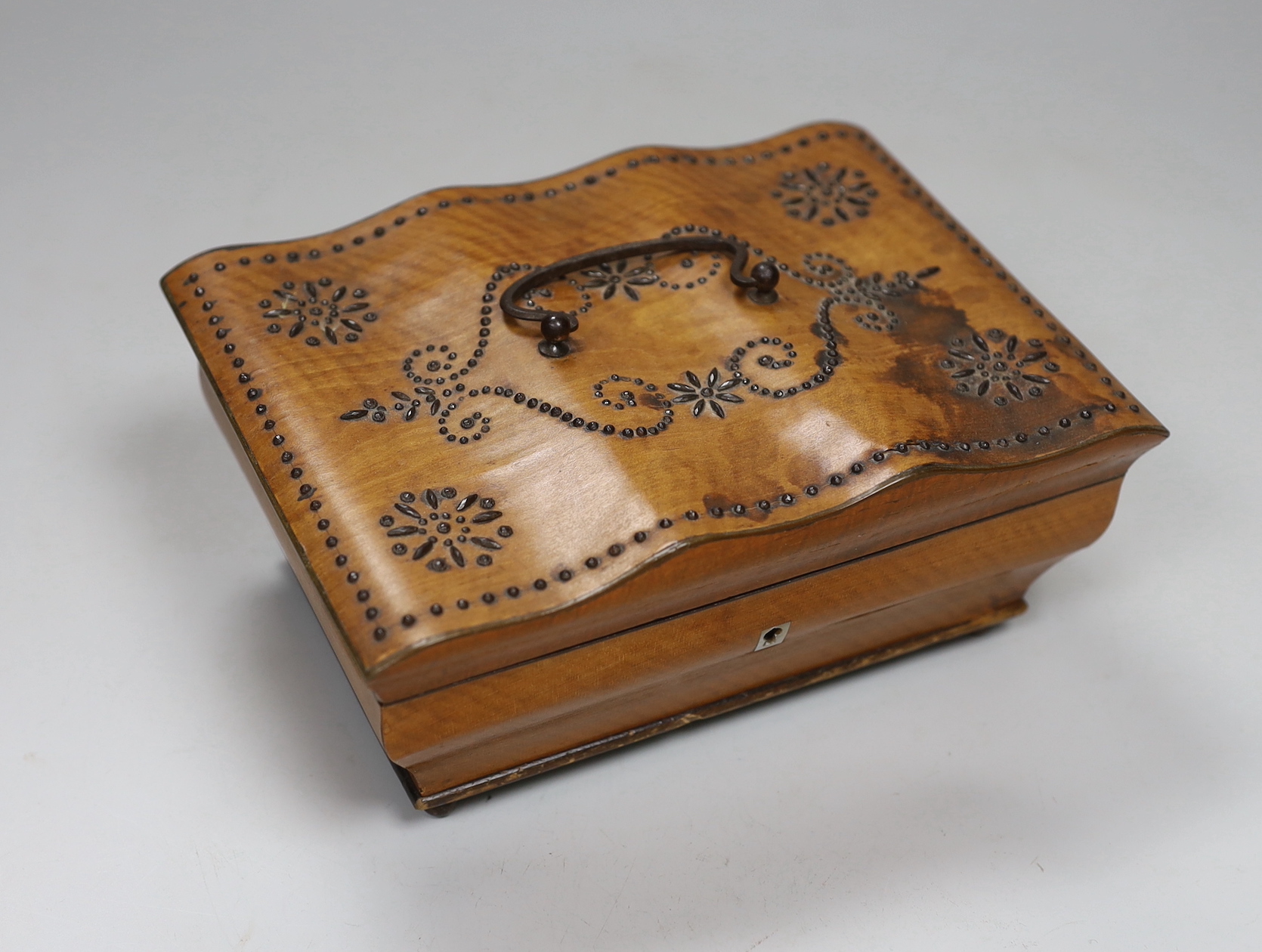 An early 19th century French West Indies satinwood and cut-steel musical sewing box, 19cm wide, 9cm high